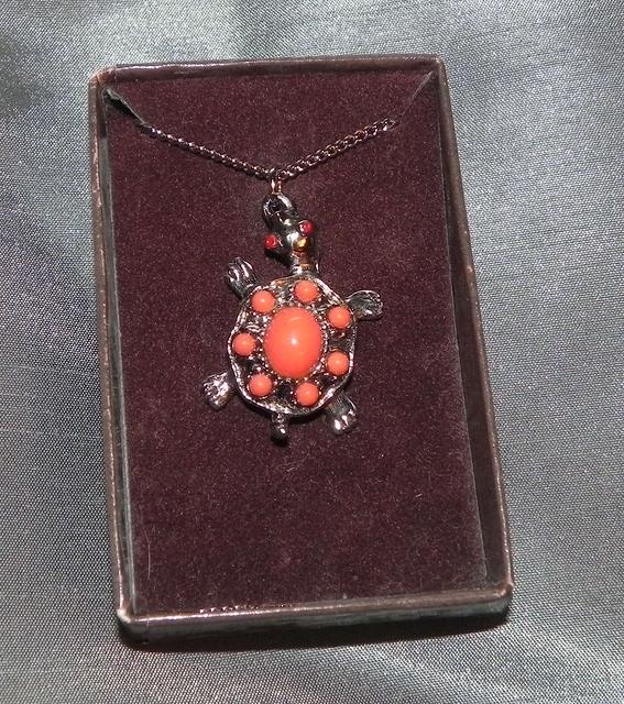 Orange turtle pendant