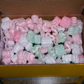 packing peanuts on top of inside box